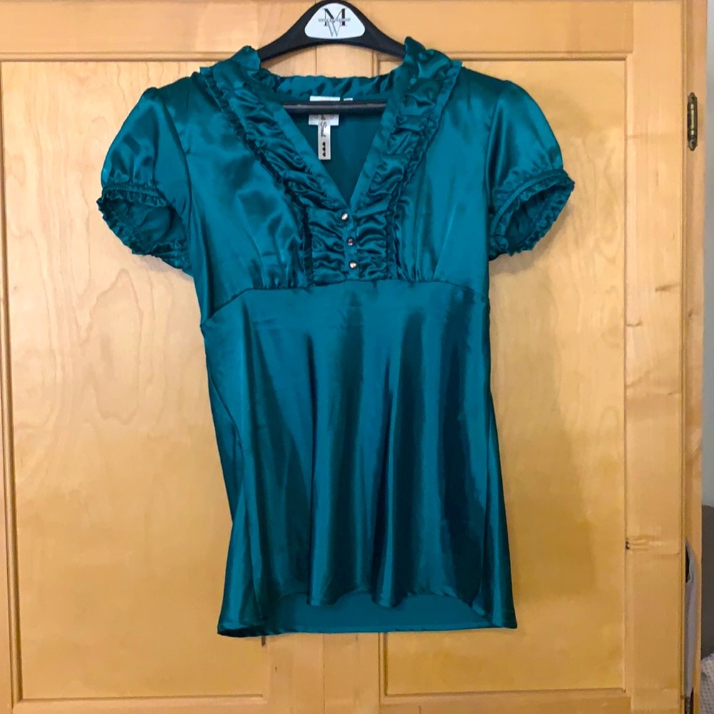 Teal satin top.
